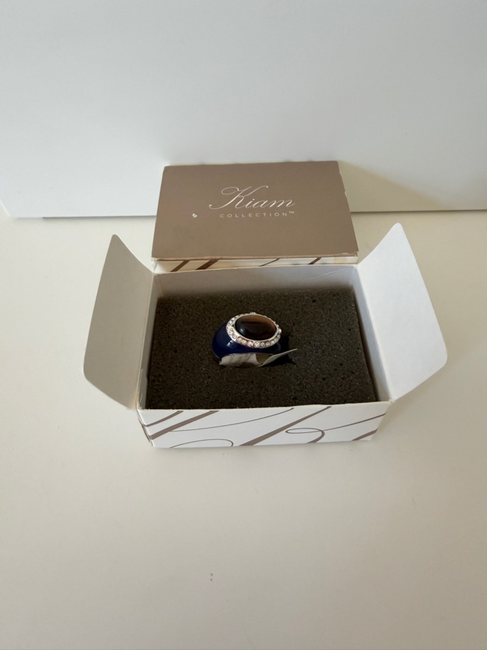 Lia Sophia Navy Blue Ring with Brown Center and Clear Accents